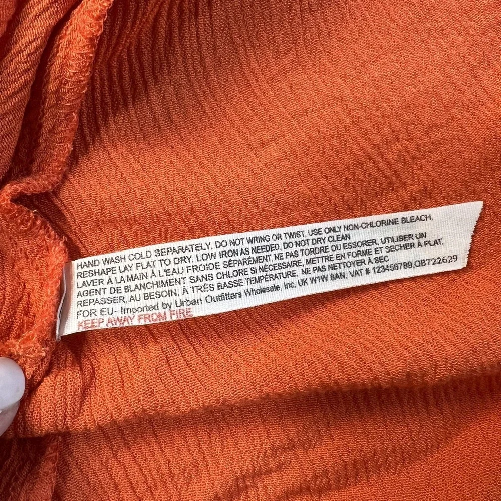 FREE PEOPLE Poncho Style Top Orange XS/S Oversized Ruffled Sleeves Collar FLAW